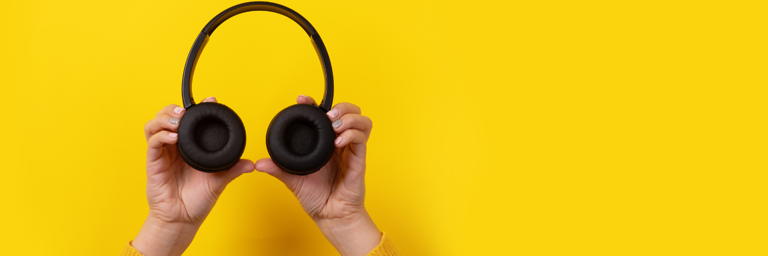 image of headphones on yellow background